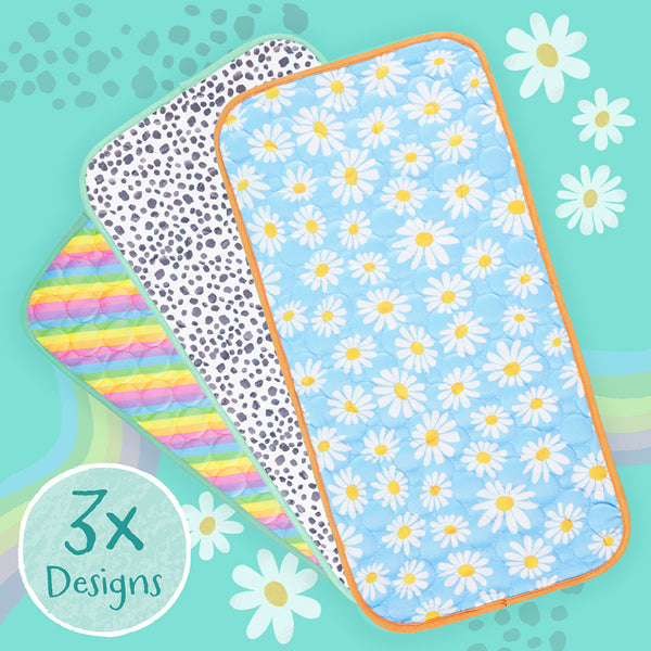 Kavee patterned lap pad in daisy, dalmatian and rainbow prints