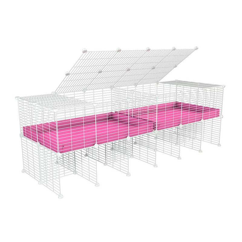 A 6x2 white C&C cage with lid divider stand for guinea pig fighting or quarantine with pink coroplast from brand kavee