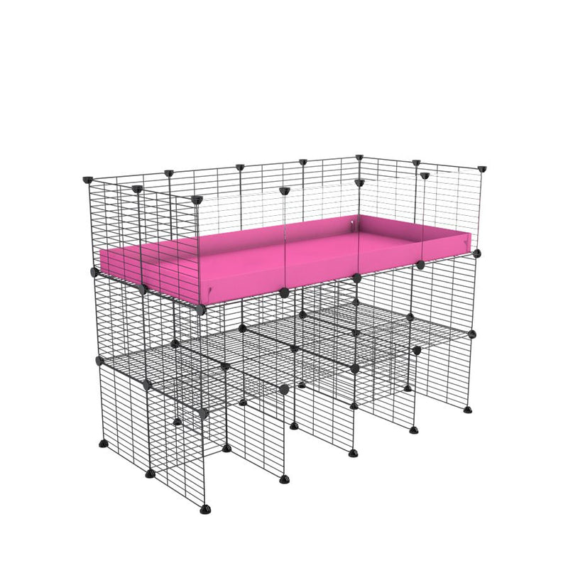 a tall 4x2 C&C guinea pigs cage with clear transparent plexiglass acrylic panels  with a double stand pink coroplast and safe baby bars grids sold in UK by kavee