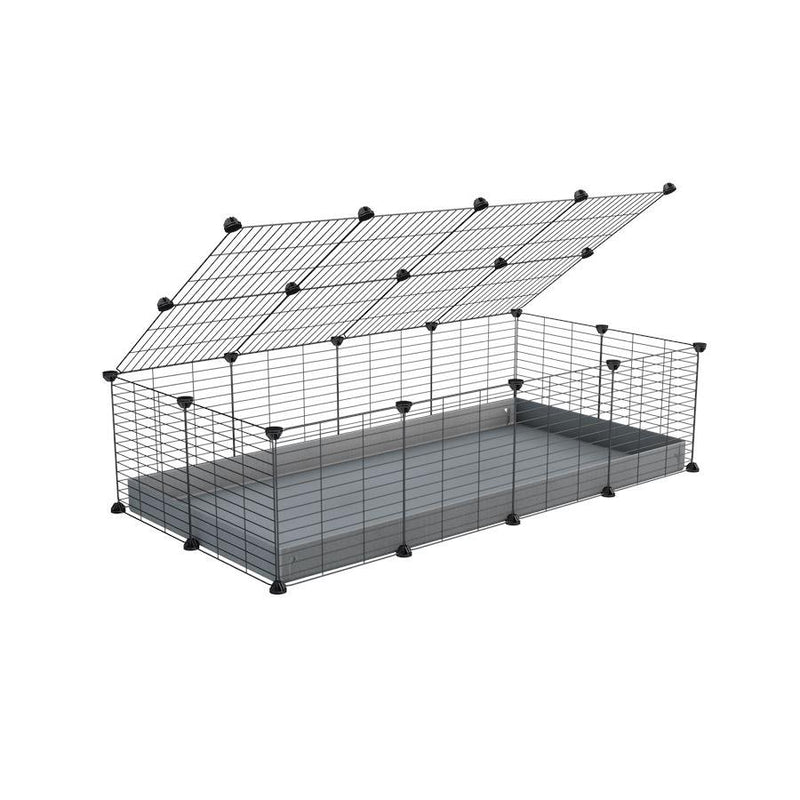 A 2x4 C and C cage for guinea pigs with grey coroplast a lid and small hole grids from brand kavee