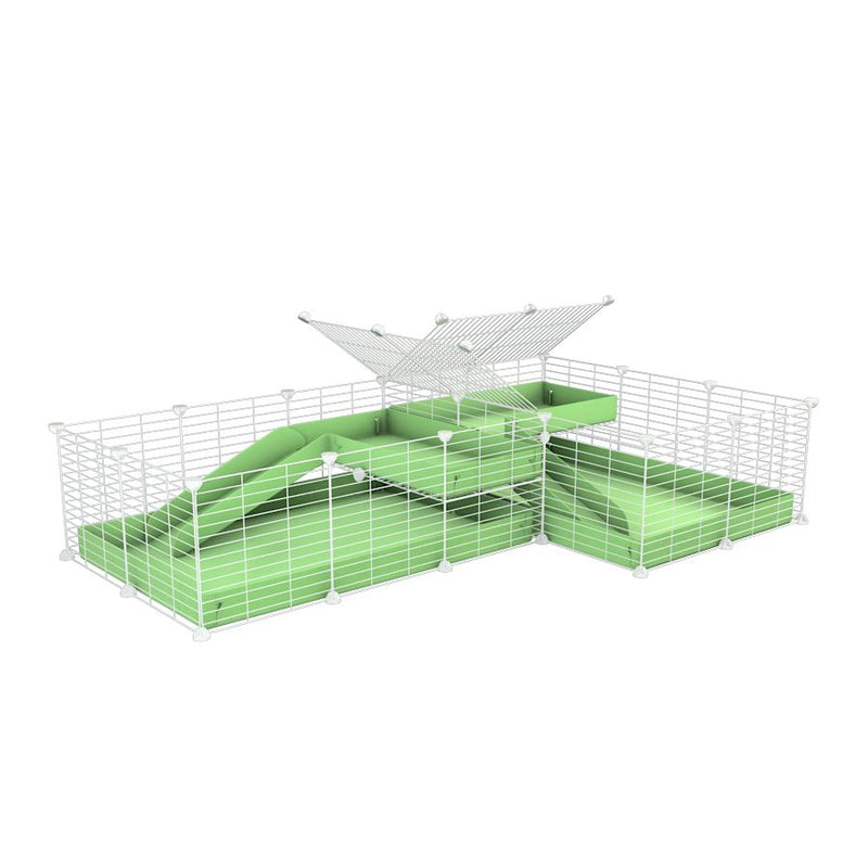 A 6x2 L-shape white C&C cage with divider and loft ramp for guinea pig fighting or quarantine with green coroplast from brand kavee