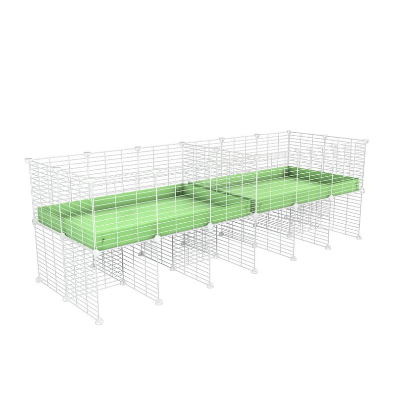 A 6x2 white C&C cage with divider and stand for guinea pig fighting or quarantine with green coroplast from brand kavee