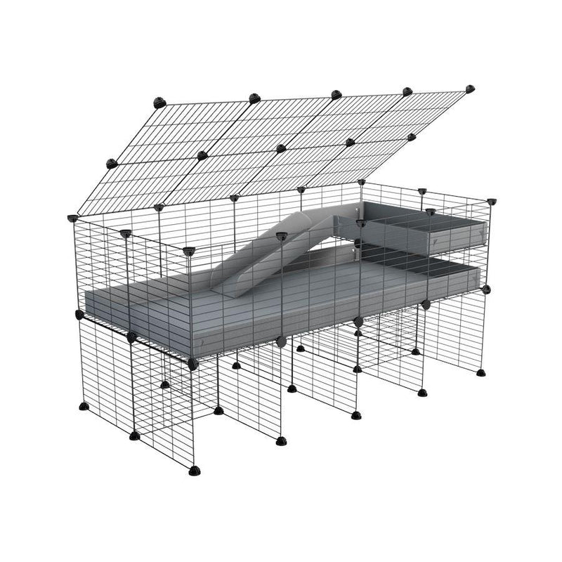 A 2x4 C and C guinea pig cage with stand loft ramp lid small size meshing safe grids grey correx sold in UK