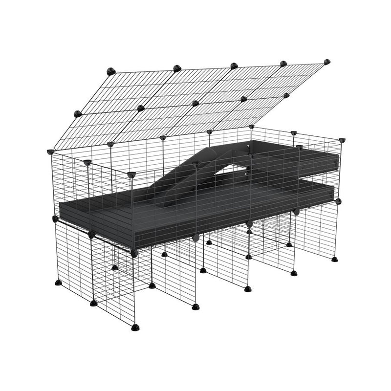 A 2x4 C and C guinea pig cage with stand loft ramp lid small size meshing safe grids black correx sold in UK