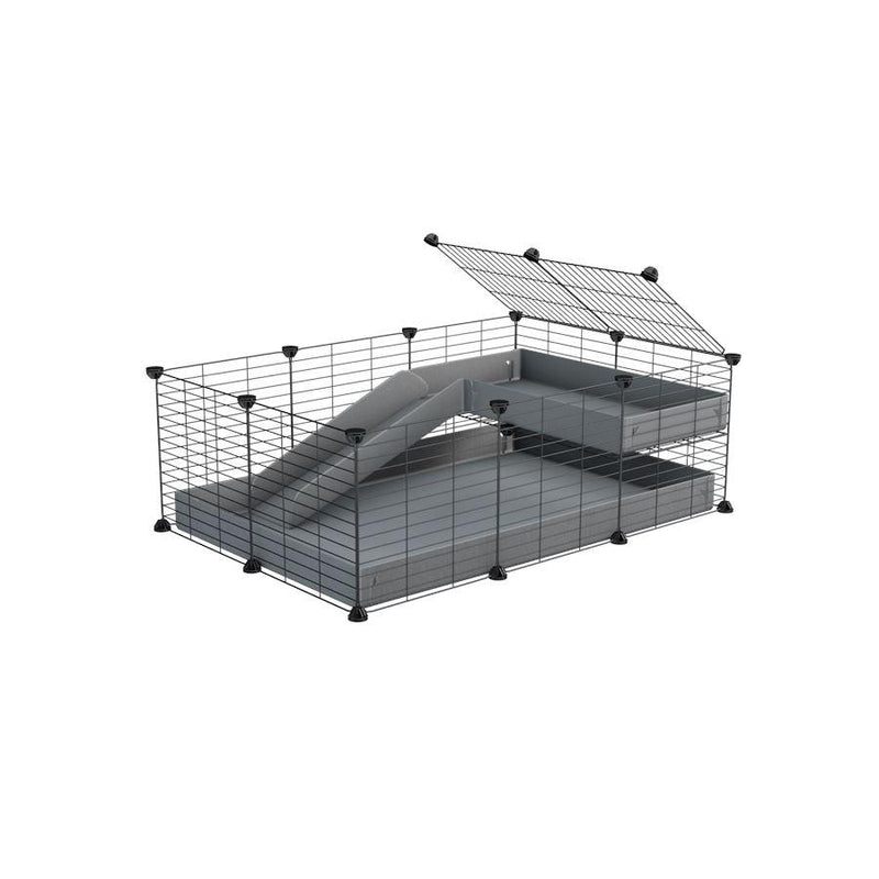 a 3x2 C&C guinea pig cage with a loft and a ramp grey coroplast sheet and baby bars by kavee