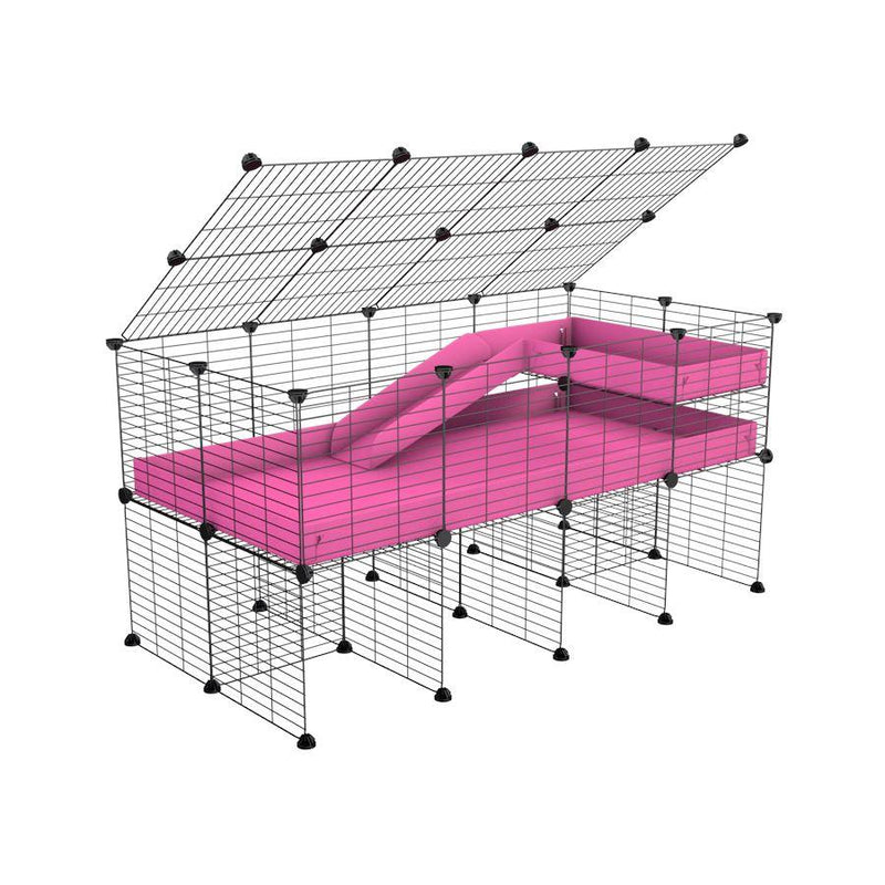 A 2x4 C and C guinea pig cage with stand loft ramp lid small size meshing safe grids pink correx sold in UK