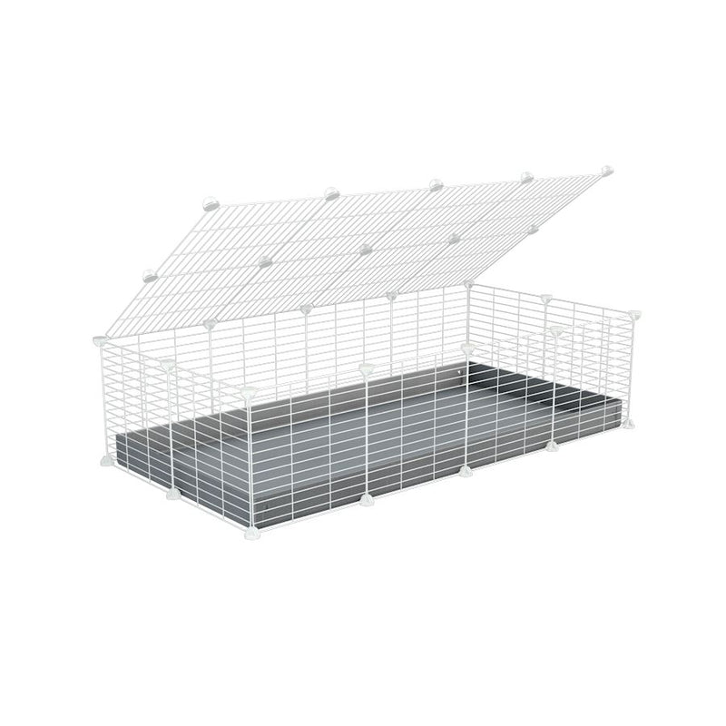 A 2x4 C and C cage for guinea pigs with grey coroplast a lid and small hole white CC grids from brand kavee