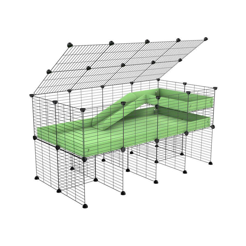 A 2x4 C and C guinea pig cage with stand loft ramp lid small size meshing safe grids green pastel pistachio correx sold in UK