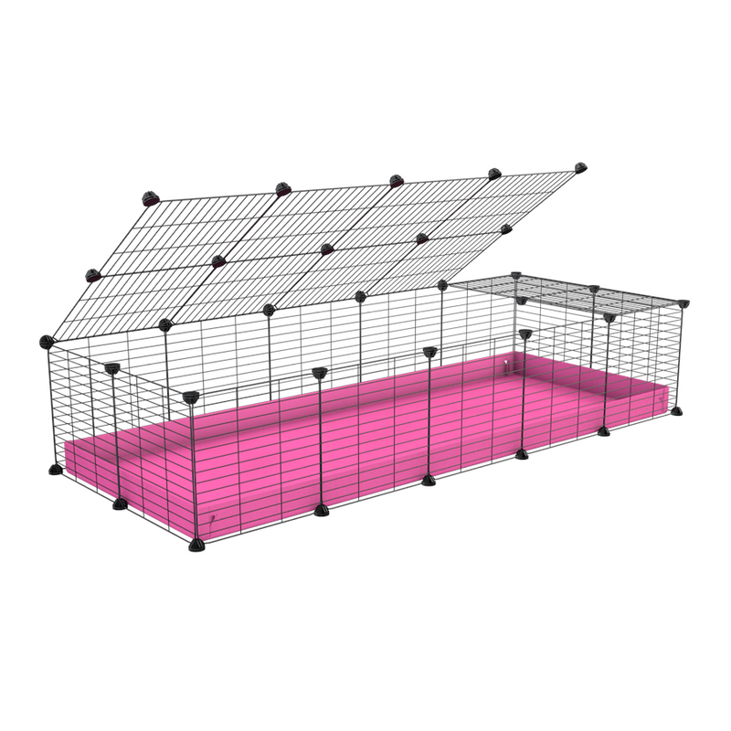 A 2x5 C and C cage for guinea pigs with pink coroplast a lid and small hole grids from brand kavee