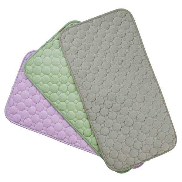 Pictured are Kavee c and c cages waterproof lap pads for guinea pigs in lilac, green, and grey.