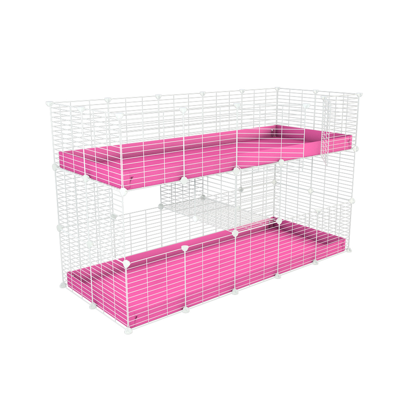 A stacked white 5x2 c&c cage for guinea pigs with two levels pink correx baby safe grids by brand kavee in the uk