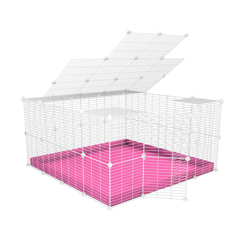 A 4x4 C&C rabbit cage with a top and safe small meshing baby bars white CC grids and green coroplast by kavee UK