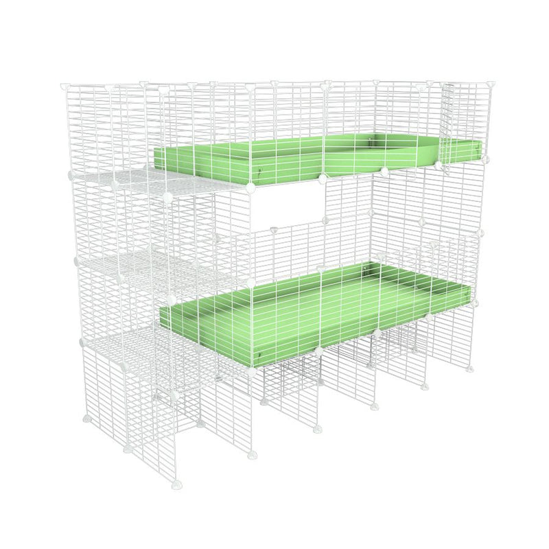 A two tier white 4x2 c&c cage with stand and side storage for guinea pigs with two levels green pastel correx baby safe grids by brand kavee in the uk