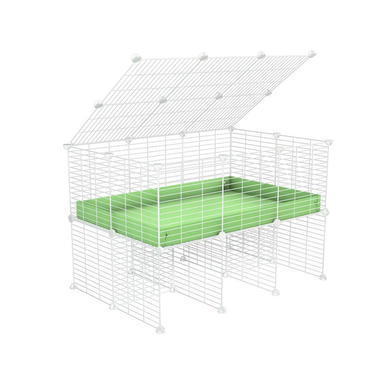 a 3x2 C&C cage for guinea pigs with a stand and a top green pastel pistachio plastic safe white grids by kavee