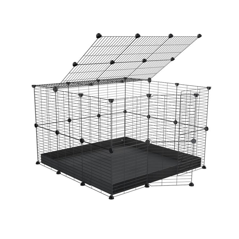 A 3x3 C and C rabbit cage with safe small size baby grids and black coroplast by kavee UK