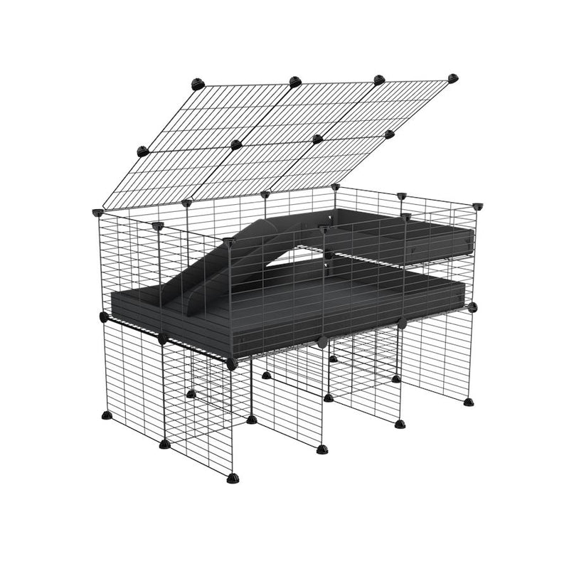 A 2x3 C and C guinea pig cage with stand loft ramp lid small size meshing safe grids black correx sold in UK
