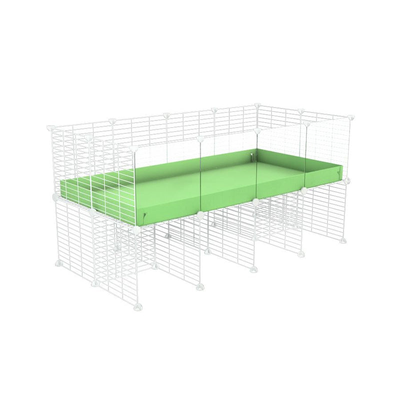 a 4x2 CC cage with clear transparent plexiglass acrylic panels  for guinea pigs with a stand green pastel pistachio correx and white C&C grids sold in UK by kavee